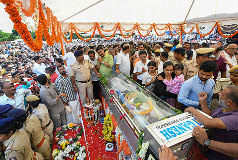 Family members and relatives pay their last respects to the mortal remains of Cafe Coffee Day founder VG Siddhartha in Chikmagalur Wednesday July 31 2019. | PTI