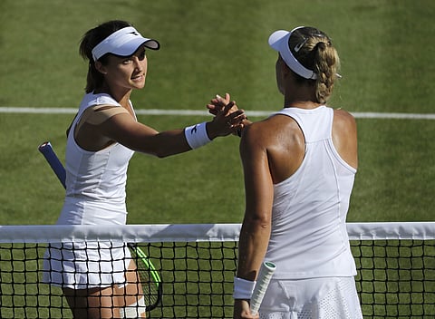 United States' Lauren Davis, left, greets Germany's Angelique Kerber after beating her in a Women's singles match during day four of the Wimbledon Tennis Championships in London. (Photo | AP)