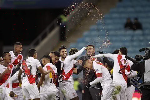 Peru's players celebrates their side's win over Chile during a Copa America semifinal match. (Photo | AP)