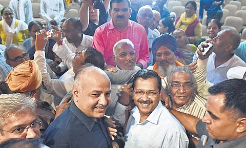 Delhi Chief Minister Arvind Kejriwal along with Deputy CM Manish Sisodia and Transport Revenue Minister Kailash Gahlot (far left) during an interactive session with senior citizens who will go on Mukhya Mantri Tirth Yatra Yojna on Thursday. ( Photo | Par