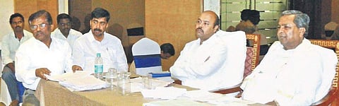 Former Chief Minister Siddaramaiah addresses a booth-level meeting with party workers in Varuna, his son Yathindra’s constituency | Express