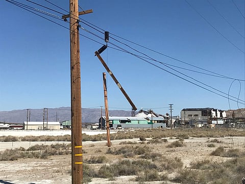 Utility poles are damaged from an earthquake in Trona, California (Photo | AP)