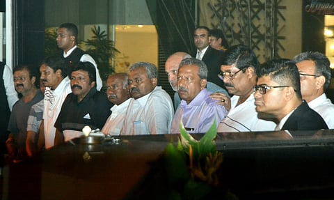 Congress MLAs from Karnataka speak to the media during their ongoing meeting with BJP leaders at a hotel in Mumbai Sunday July 7 2019. (Photo | PTI)