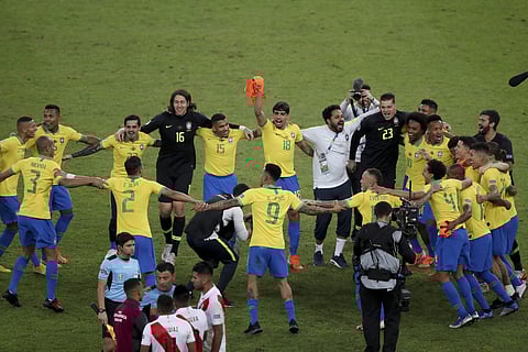 Brazil players celebrate their win over Peru at the end of the final soccer match of the Copa America at the Maracana stadium (Photo | AP)