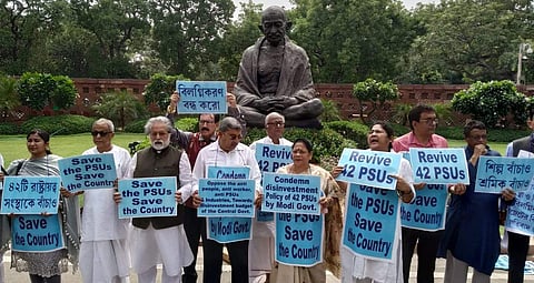 Trinamool MPs protest outside the Parliament on Monday. | Express Photo Services