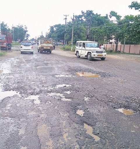The damaged Bainipur-Phulbad NH stretch I Express