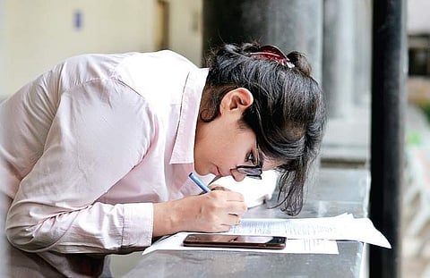 A student filling up the form for the new academic session. ( Photo | EPS)