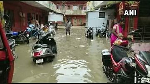 Heavy rainfall has thrown life out of gear in Vadodara. (Photo| ANI Twitter)