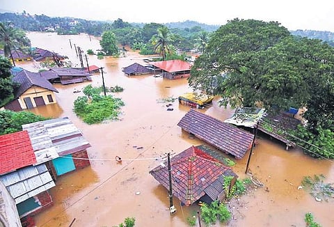 Houses along the Nethravati river bank at Panemangaluru, in Bantwal taluk. | Express Photo Services