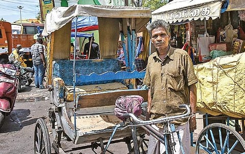 C Maiyappan aka Selvan with his cycle rickshaw in Gandhi Market | M K Ashok Kumar