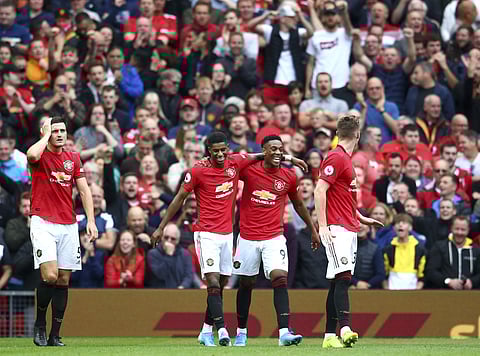 Manchester United's Anthony Martial, 2nd right, celebrates with teammates after scoring his sides second goal. (Photo | AP)