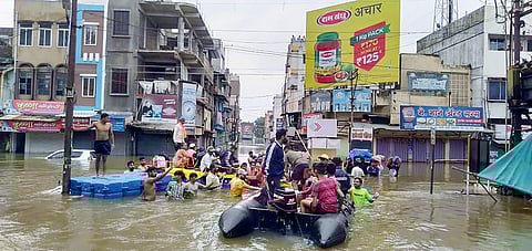 Indian Navy personnel rescue residents from flood-hit area in Sangli and Kolhapur districts of Maharashtra Saturday August 10 2019. | PTI