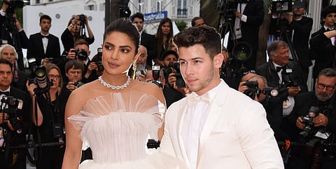Actress Priyanka Chopra with husband Nick Jonas (File Photo | PTI)