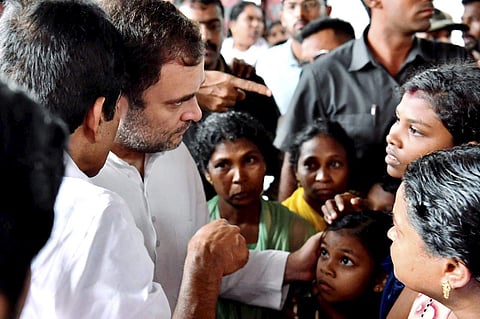 Congress leader Rahul Gandhi interacts with the people affected by floods and landslides at Bhoothanam in his parliamentary constituency Wayanad Sunday August 11 2019. | PTI