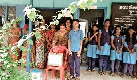 The collection box at Vrindavan High School being set up