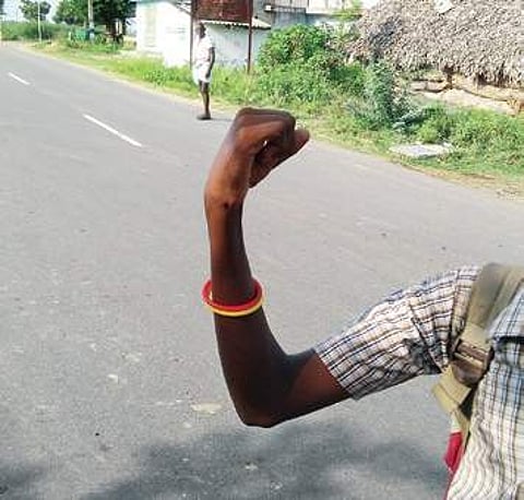 A school student seen wearing the infamous ‘caste band’ | Express
