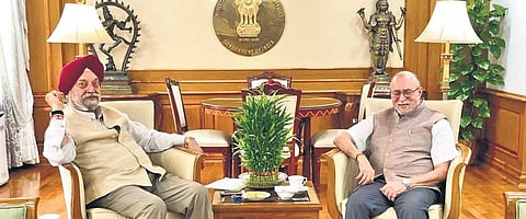 Union minister Hardeep Singh Puri with Delhi Lieutenant Governor Anil Baijal on Tuesday. (Photo | Twitter)