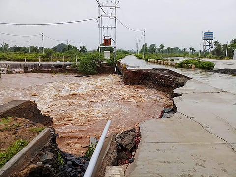 A damaged road after heavy monsoon downpour in Mandsaur Madhya Pradesh. (Photo | PTI)