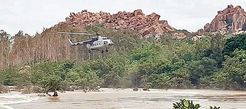 A rescue operation under progress at Virupapura Gaddi (island) in Koppal District. | Express Photo Services