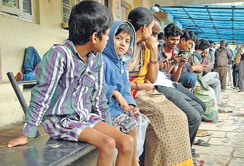 Hundreds of patients wait at the Fever Hospital in Hyderabad. (Photo | S Senbagapandiyan, EPS)