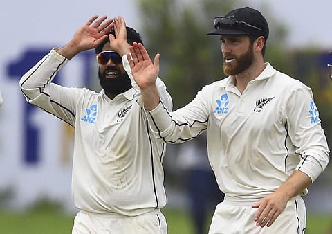 New Zealand's Ajaz Patel (L) celebrates with teammate team captain Kane Williamson. (Photo | AFP)