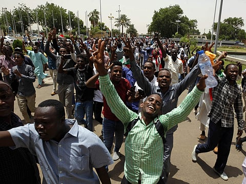 Sudanese celebrate following the signing of a power-sharing agreement in the capital Khartoum, Sudan. ( Photo | AP )