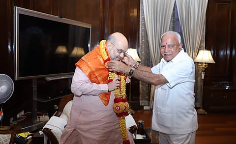 Chief Minister B S Yediyurappa met Union Home Minister Amit Shah in Delhi on Saturday. | Express Photo Services