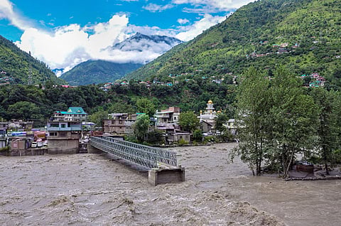 view of the destruction caused by the swollen Beas river following heavy monsoon rain in Kullu. (Photo | PTI)