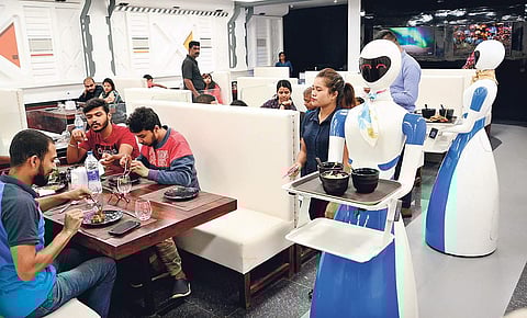 Robots at work as servers at the newly inaugurated restaurant on 100-feet Road in Indiranagar | Shriram B N