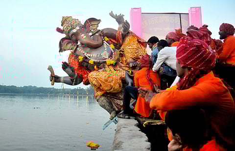 Devotees carry an idol of Lord Ganesh to be immersed in water on the last day of Ganesh Chaturthi festival( File Photo | PTI)