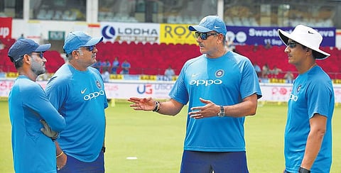 Sanjay Bangar (right) will make way for Vikram Rathour as batting coach beginning with the home series against South Africa next month.