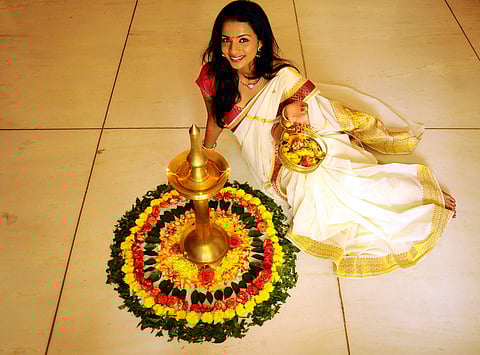 Shruti Hariharan, Actress pose near a pookalam. (Photo | EPS)