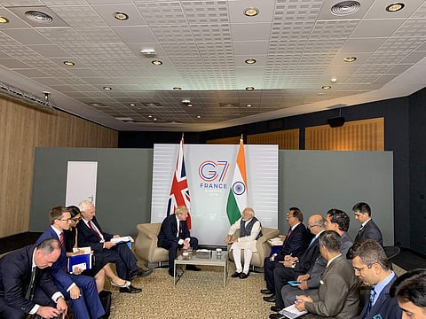 Prime Minister Narendra Modi and his British counterpart Boris Johnson meet for the G7 summit in France on 25th of August, 2019. (Photo | @PMOIndia, Twitter)