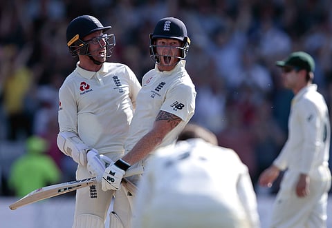 England's Ben Stokes, center, with Jack Leach celebrates after scoring the winning runs on the fourth day of the 3rd Ashes Test. (Photo | AP)