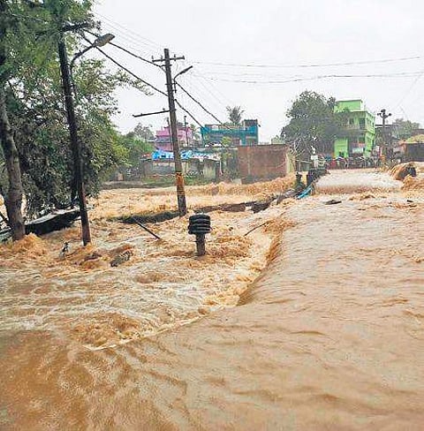 File photo of water flowing over a road in Balangir