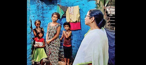 CM Mamata Banerjee visits a slum area in Howrah district of West Bengal. Over 38 lakh families in the state lack a concrete roof over their heads. (File Photo)
