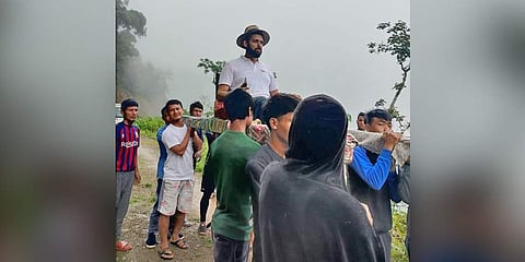 The villagers were so happy to see the DM that they carried him on a palanquin. (Photo| EPS)
