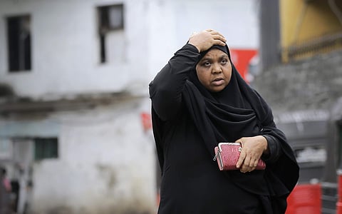 A Sri Lankan Muslim woman walks in a street in Colombo, Sri Lanka. (Photo | AP)