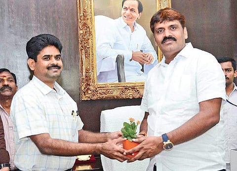 Mayor Bonthu Rammohan Rao welcoming the newly appointed GHMC Commissioner Lokesh Kumar at his office in Hyderabad on Tuesday | Express