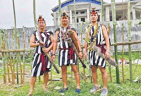 Nyishi men in traditional attire.