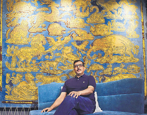 Bent Chair owner Neeraj Jain with some of the pieces on display at his store in Delhi. (Photo | Shaurya Sharma)