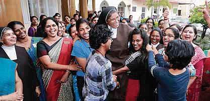 Students of St Teresa’s College celebrate with director Sr Vineetha after the institution was awarded A++ grade by NAAC | Express