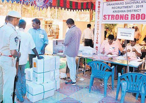 Question paper bundles of ward secretariat exam being dispatched to various exam centres in the city on Friday (Photo |EPS)