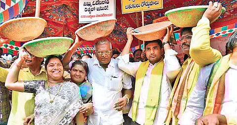 TDP leader Nara Lokesh staging a protest over rising sand prices in Mangalagiri on Friday | Express