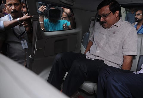 Former PWD Secretary TO Sooraj being taken to Vigilance Court in Muvattupuzha after his arrest was recorded by VACB in Palarivattom flyover graft case. (Photo | A Sanesh, EPS)