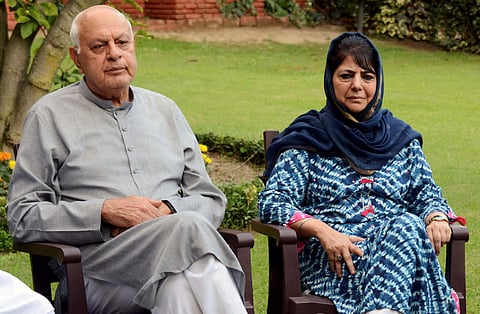 National Conference President Farooq Abdullah with PDP President and former chief minister Mehbooba Mufti during an all-party meeting regarding the current situation in Kashmir in Srinagar on 4 August 2019. (Photo | PTI)