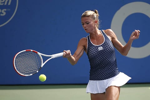 Camila Giorgi returns the ball during a semifinal against Caty McNally at the Citi Open tennis tournament. (Photo | AP)