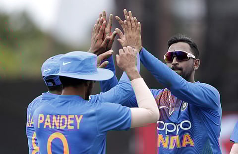 Krunal Pandya celebrates a wicket. (Photo | AP)