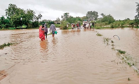 Nirmal’s Bhainsa and Mahagam villages cut off after low-lying bridges were submerged (Photo |EPS)