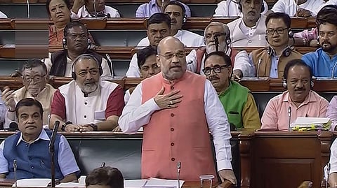 Home Minister Amit Shah in the Lok Sabha while tabling the Jammu and Kashmir Reorganisation Bill 2019 on Tuesday, 6 August 2019. (LSTV screengrab)